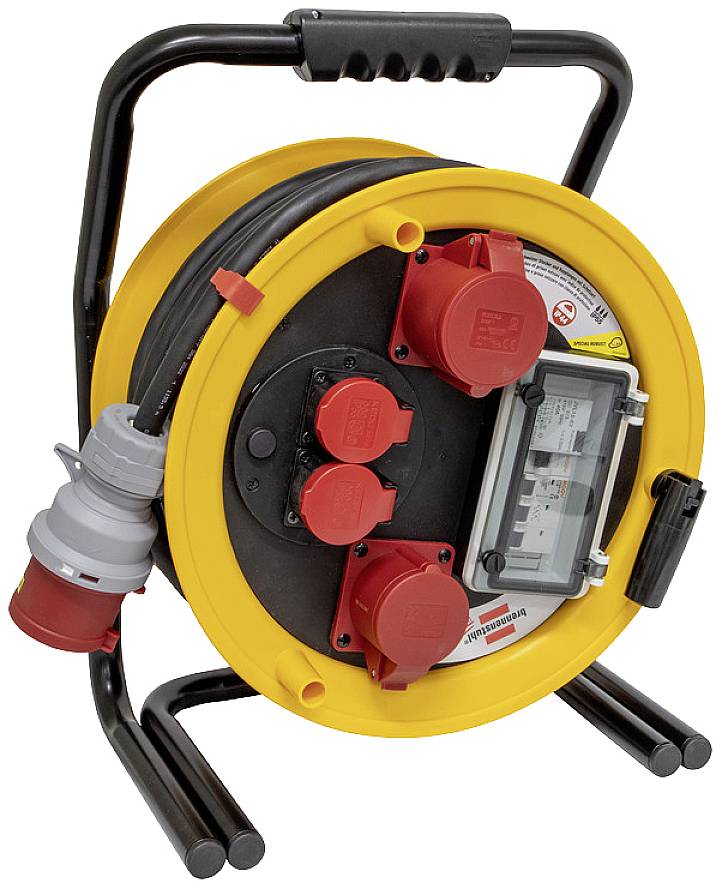 Un enrouleur de câble jaune avec plusieurs prises électriques et un interrupteur, adapté aux chantiers ou aux événements en extérieur.