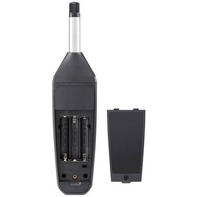 Un appareil électronique ouvert et sombre montre un compartiment pour deux piles AA, avec son couvercle retiré à côté.