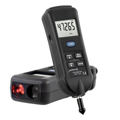 Tachymètre numérique portatif affichant 47265 tr/min, équipé d'une unité de capteur séparée avec émetteur laser rouge pour mesurer la vitesse de rotation.