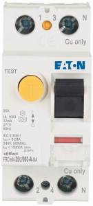 Disjoncteur avec bouton de test jaune et levier noir ; nom de marque 'EATON' visible.