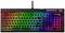 Un clavier de gaming avec éclairage RGB arc-en-ciel. Les touches s'illuminent dans différentes couleurs et le logo HyperX est visible en haut à droite.