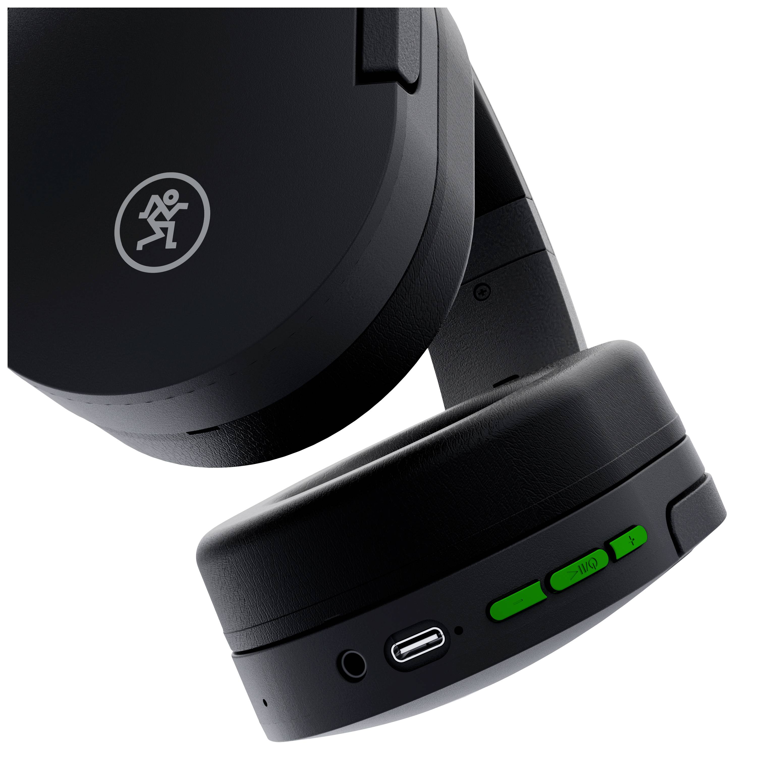 Casque audio avec port USB-C et interrupteur vert sur l'écouteur droit. Un logo représentant une silhouette humaine en mouvement est visible.