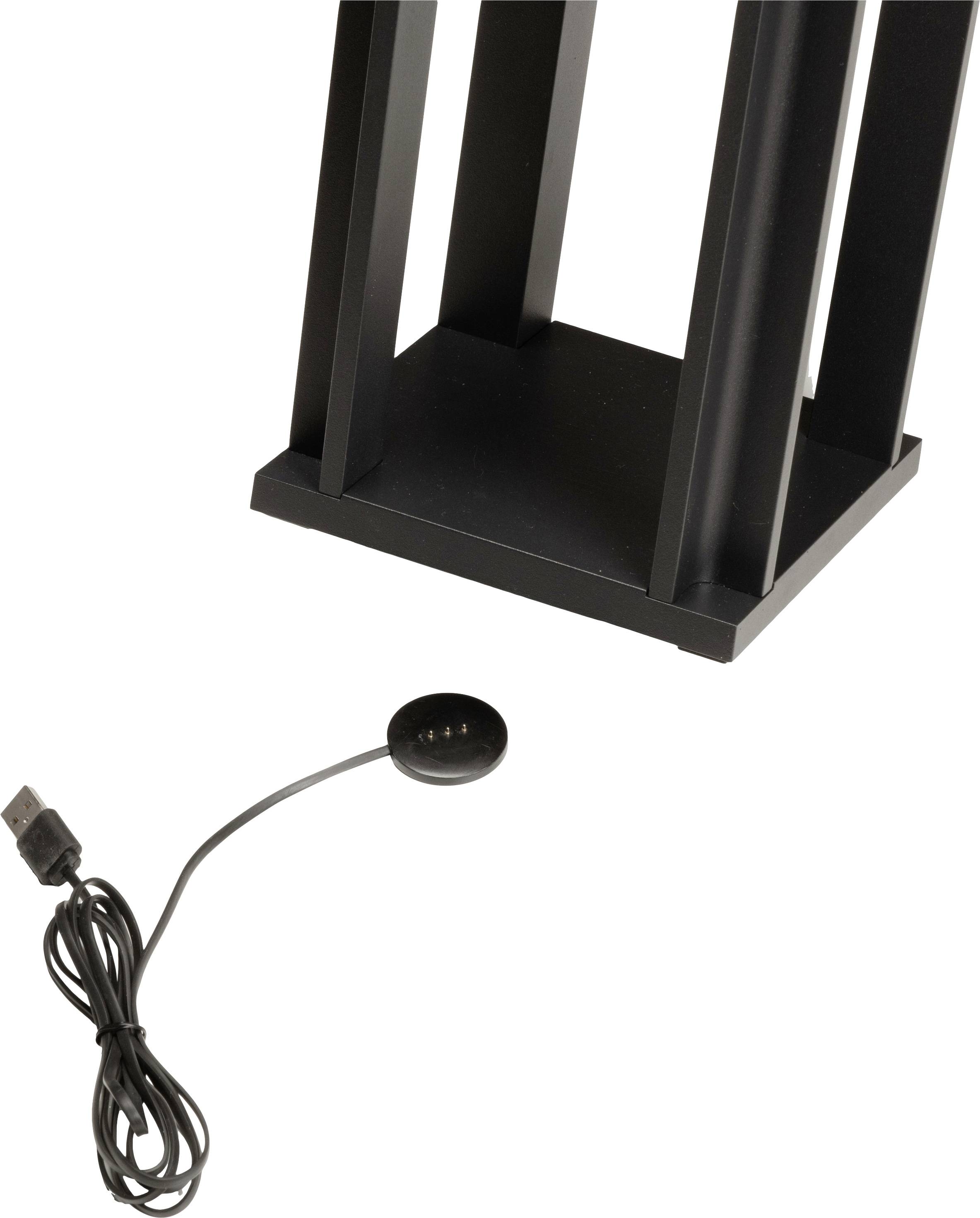 Un pied de lampe noir à base rectangulaire, à côté d'un câble USB libre avec une connexion circulaire.