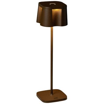 Lampadaire avec un abat-jour brun foncé et un pied étroit et long. Il diffuse une lumière chaude et douce.