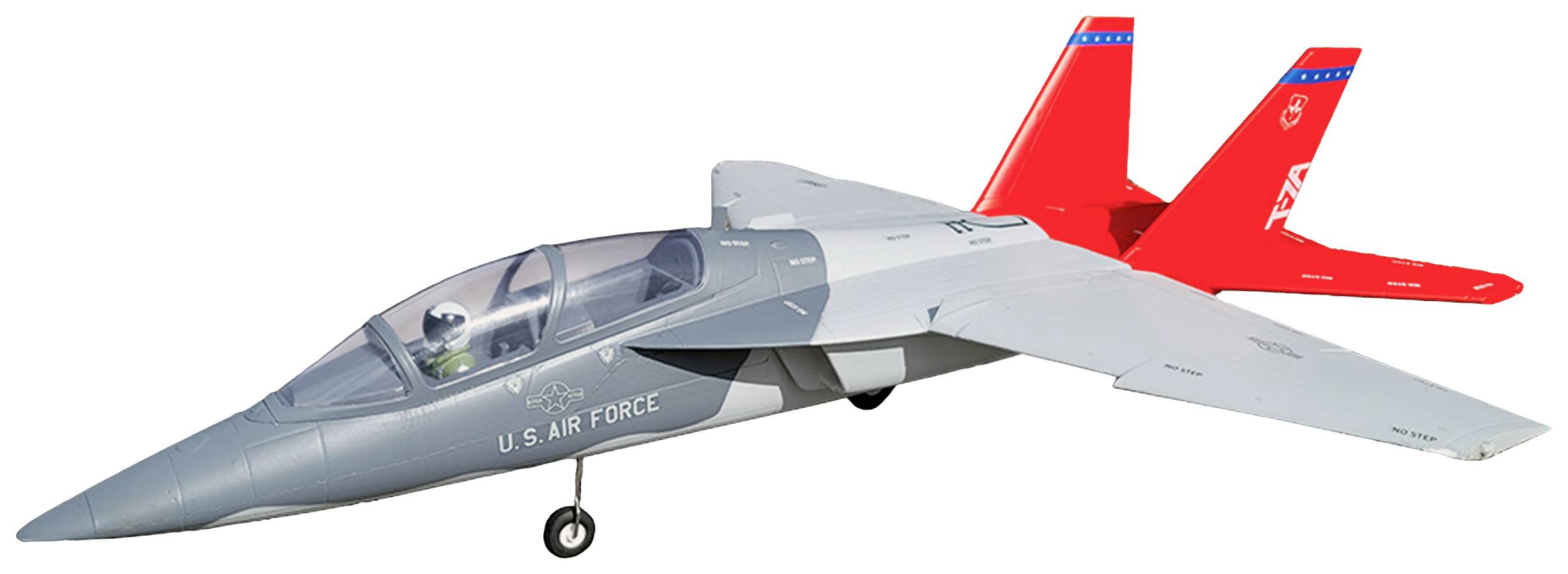 Un avion-modèle au design gris et rouge portant l'inscription 'U.S. Air Force'. Une petite figurine est assise dans le cockpit.