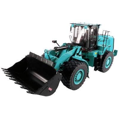 Chargeur articulé vert avec grand godet, prêt pour des travaux de terrassement ou le transport de matériaux.
