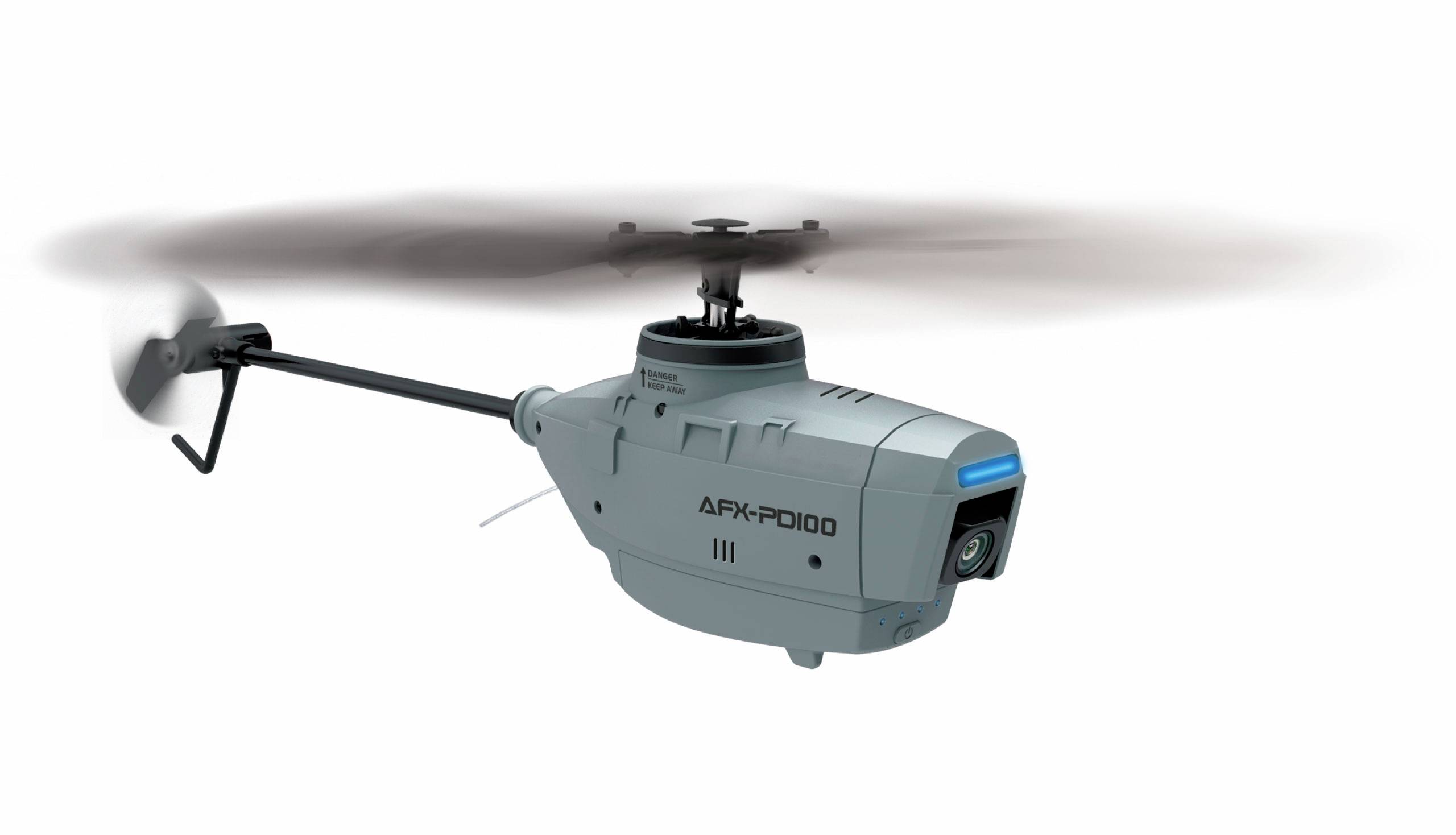 Un petit drone gris dans les airs, équipé d'une caméra visible et de pales de rotor. Il porte l'inscription 'APX-PD100'.