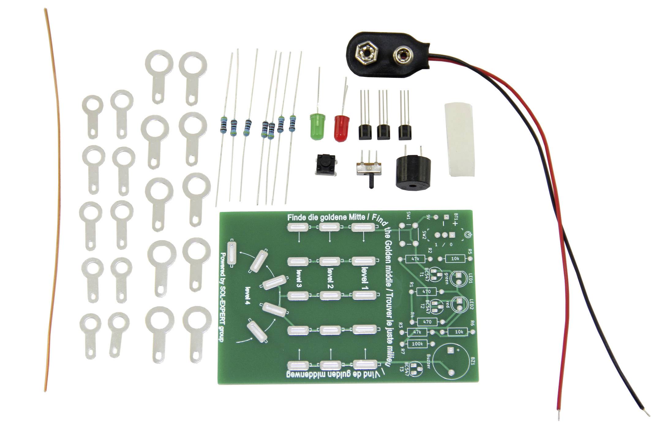 Kit électronique comprenant un circuit imprimé, des résistances, des condensateurs, des diodes, des câbles et un clip de batterie. Composants pour montage personnel.
