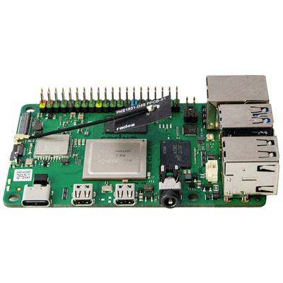 Un module de circuit imprimé vert avec plusieurs connexions, ports et une grande puce centrale. Il semble s'agir d'un ordinateur monocarte.