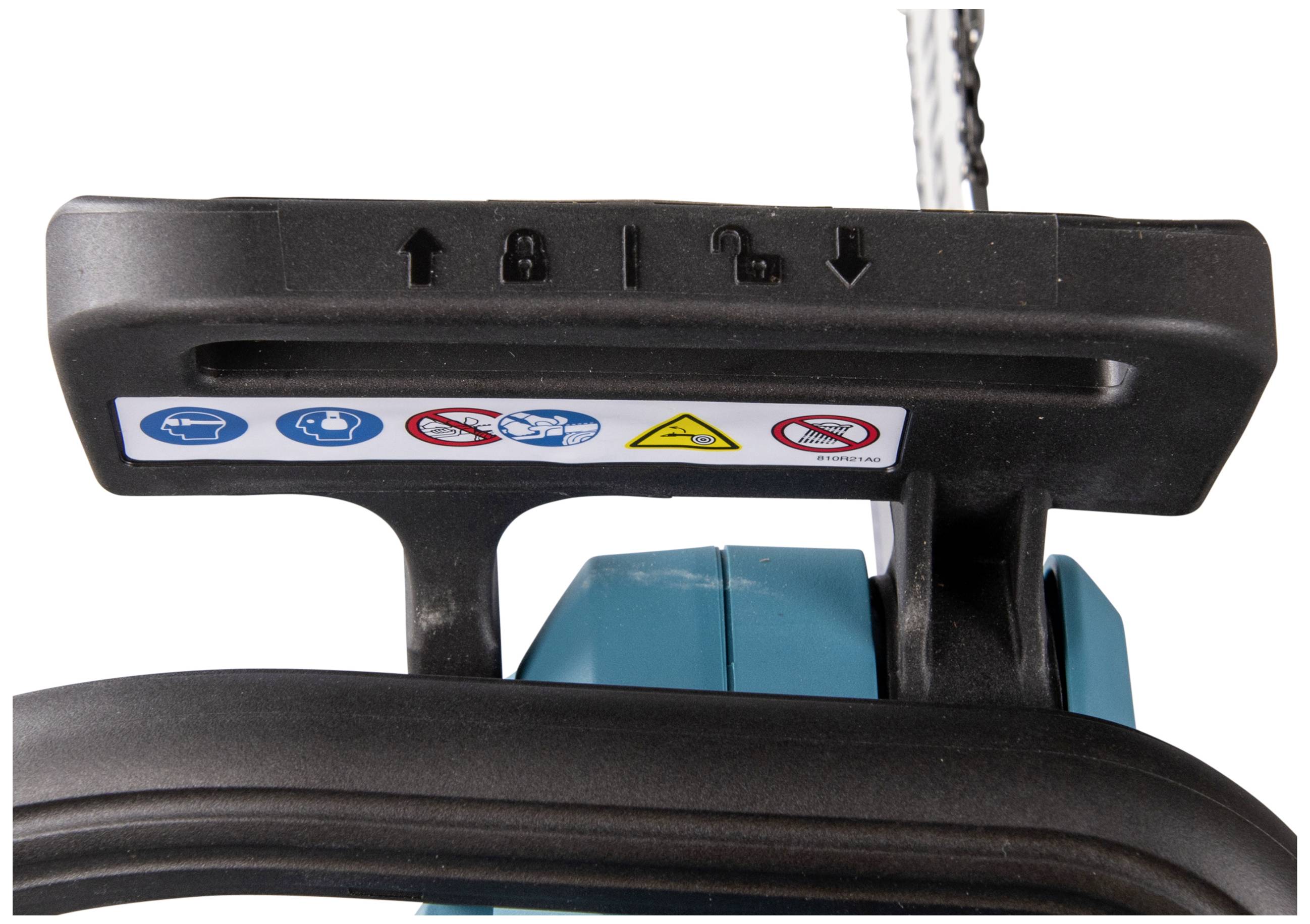 'Symboles de mode d'emploi sur une pièce en plastique noir d'une tronçonneuse. Les symboles contiennent des avertissements et des instructions d'utilisation.'