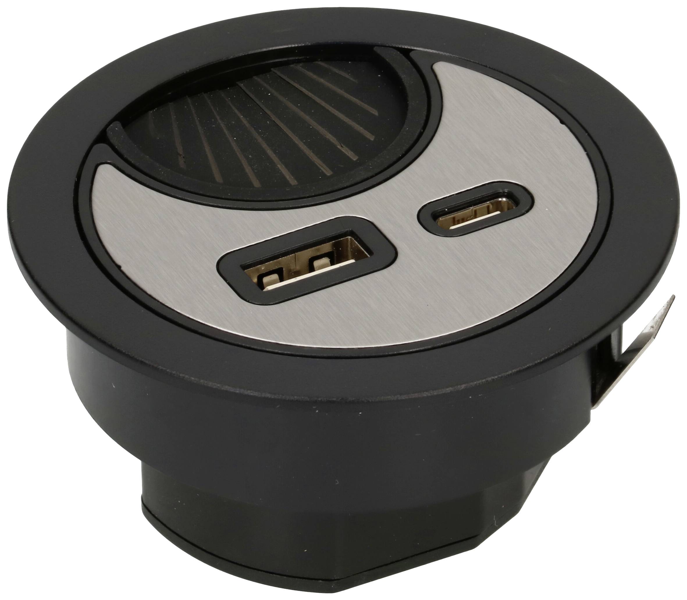Port USB et USB-C intégrés dans un support rond noir, adapté pour l'installation dans des meubles ou des surfaces de travail.