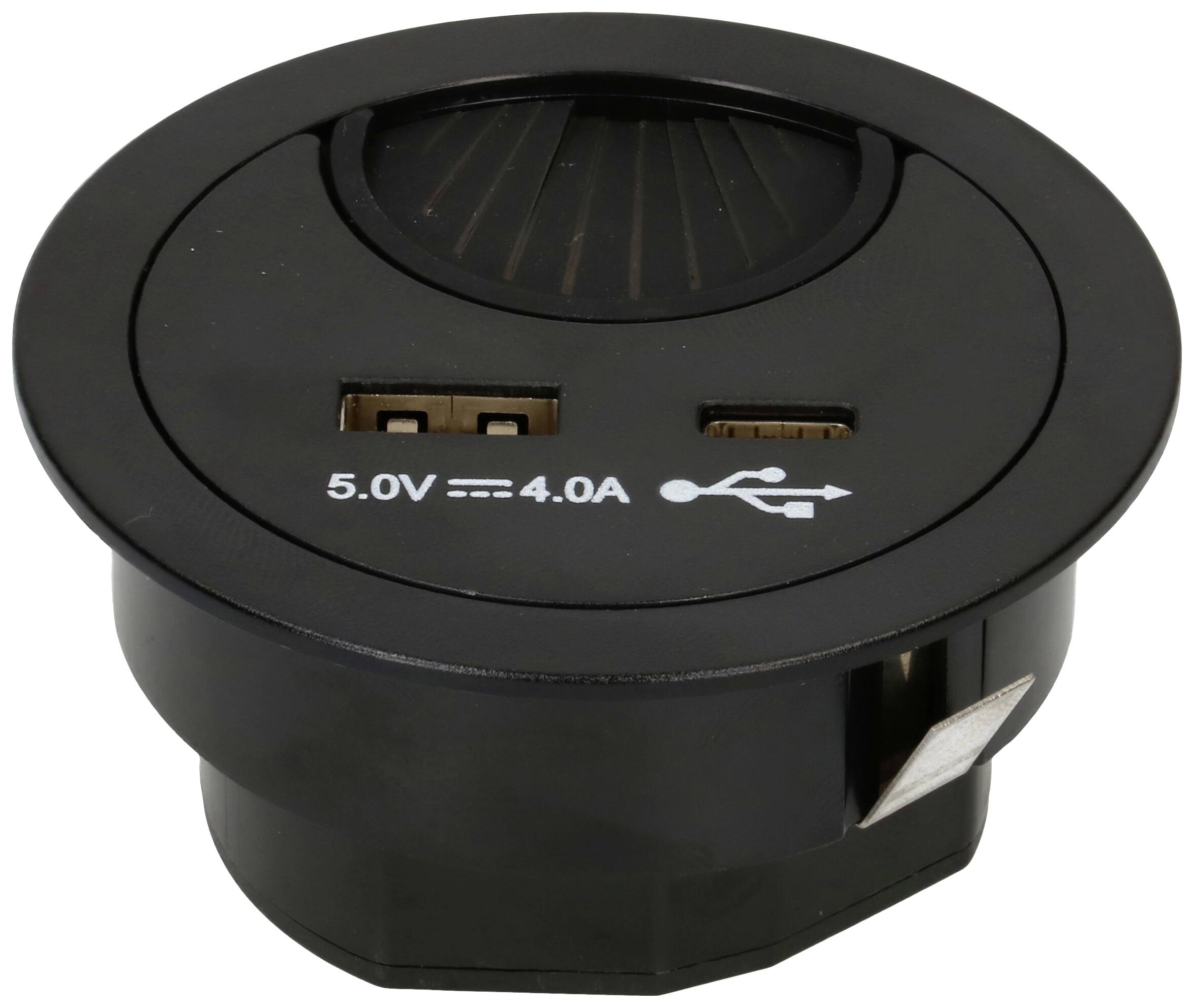 Prise de table ronde noire avec deux ports USB, portant l'inscription '5,0V 4,0A', adaptée pour charger des appareils.