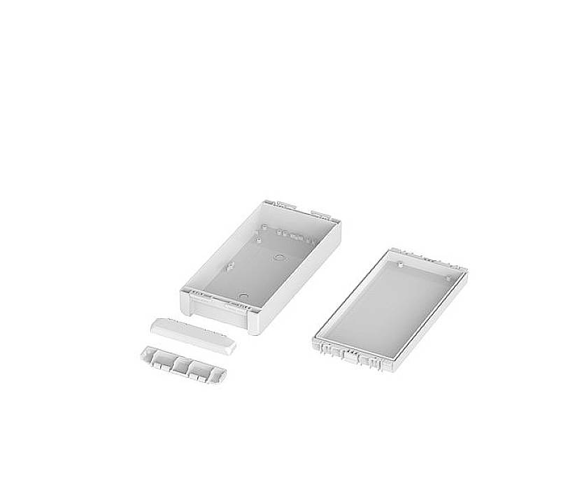 Un conteneur rectangulaire blanc en plastique, ouvert. Le couvercle est posé à côté. Le design est simple et fonctionnel.