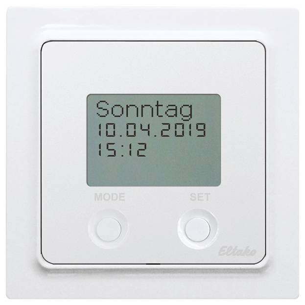 Affichage numérique avec le jour de la semaine 'Dimanche', la date '10.04.2019' et l'heure '15:12'. Deux touches en dessous, étiquetées 'MODE' et 'SET'.