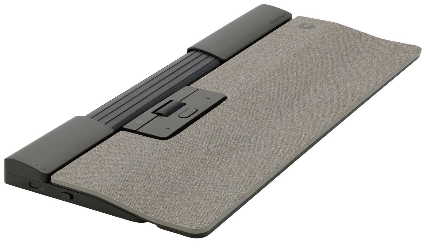 Un clavier sans fil à disposition ergonomique, avec une surface textile et un repose-poignets intégré pour une frappe confortable.