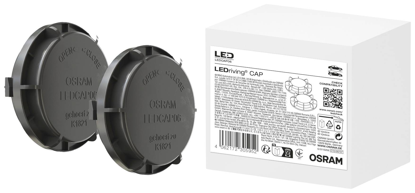 Deux capuchons ronds noirs en LED d'Osram à côté d'un emballage blanc avec un mode d'emploi et des informations sur le produit.