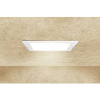 Une applique encastrée LED carrée émet une lumière blanche et vive dans une pièce aux murs et plafond beiges.