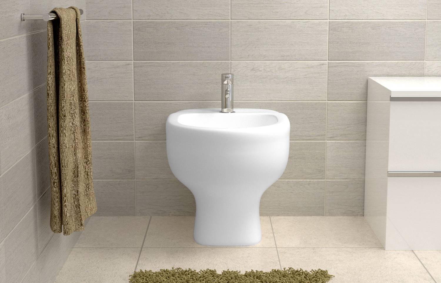 Un bidet blanc sur un sol carrelé beige, à côté d'une serviette suspendue au mur et d'un meuble de salle de bain.