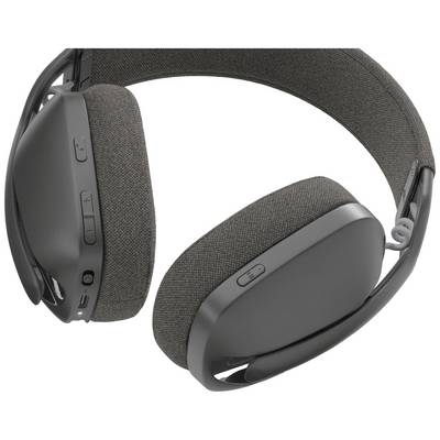 Casque audio noir circumauriculaire avec coussinets et arceau rembourrés. Touches de réglage du volume et connexions sur le côté.