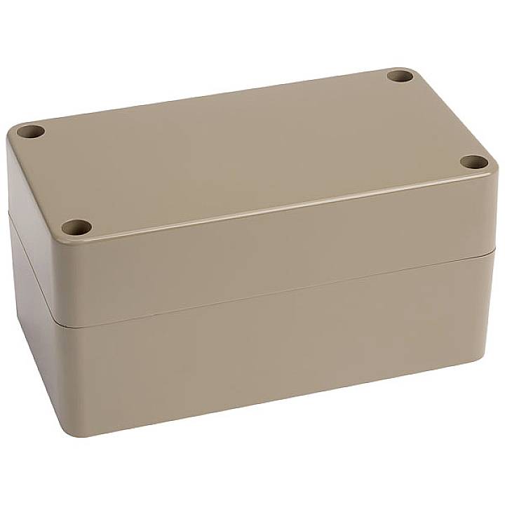 Boîtier rectangulaire de couleur beige avec des coins arrondis et des trous pré-percés aux quatre angles. Adapté pour loger des composants électroniques.