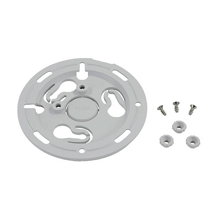 Support rond blanc avec quatre vis et écrous pour la fixation. Porte l'inscription 'PUSH' au centre du support.
