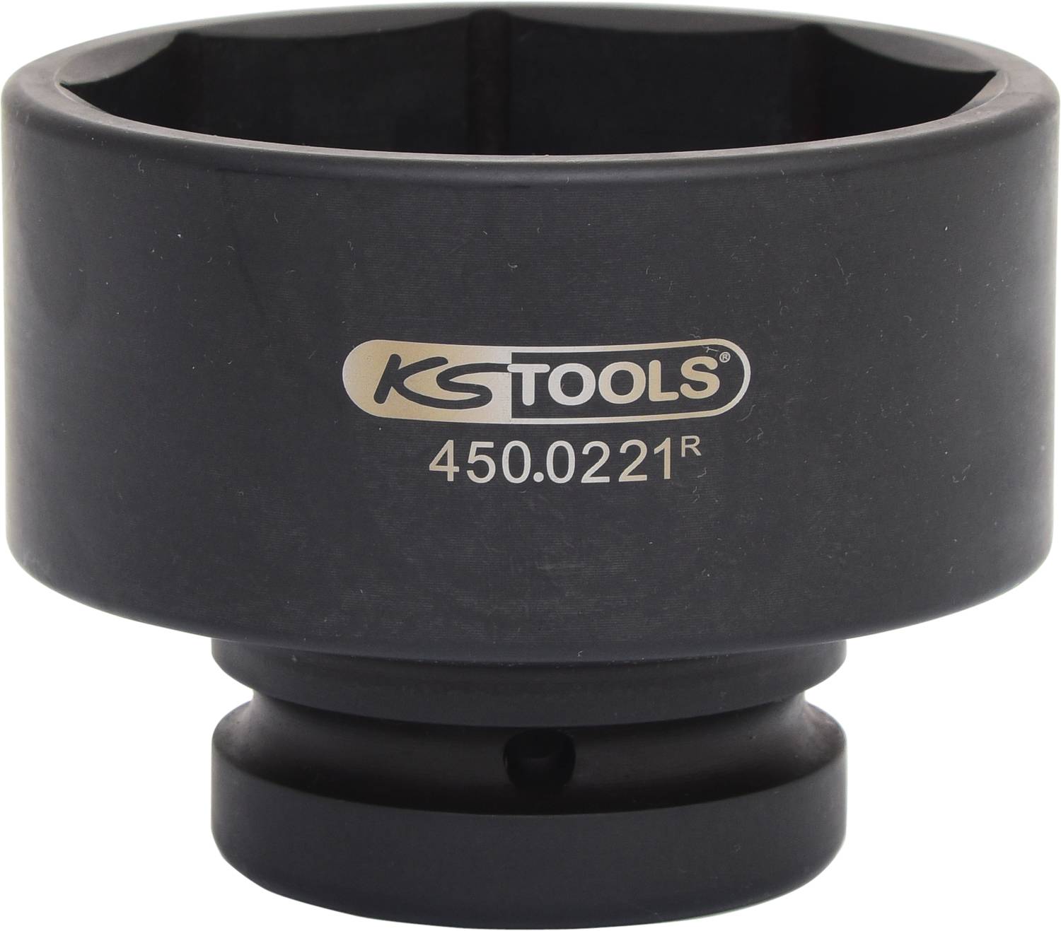 Un écrou noir avec l'inscription 'KS TOOLS 450.0221R', utilisé pour le montage ou le démontage de écrous spéciaux.