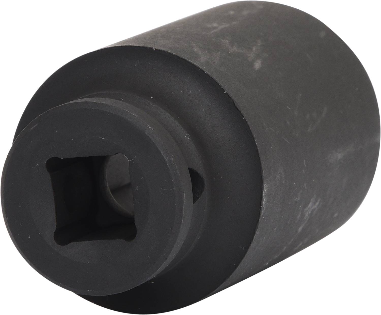 Adaptateur cylindrique sombre avec ouverture carrée, probablement destiné à un usage d'outillage.