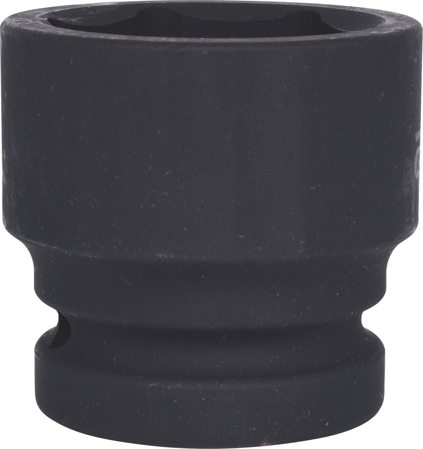Adaptateur de clé grise, cylindrique et court, avec surface mate. Adapté à une utilisation manuelle ou mécanique.