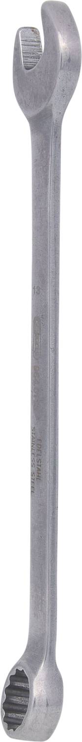 Une clé à fourche en argent avec une extrémité ouverte et un anneau, utilisée pour serrer ou desserrer des écrous et des boulons.
