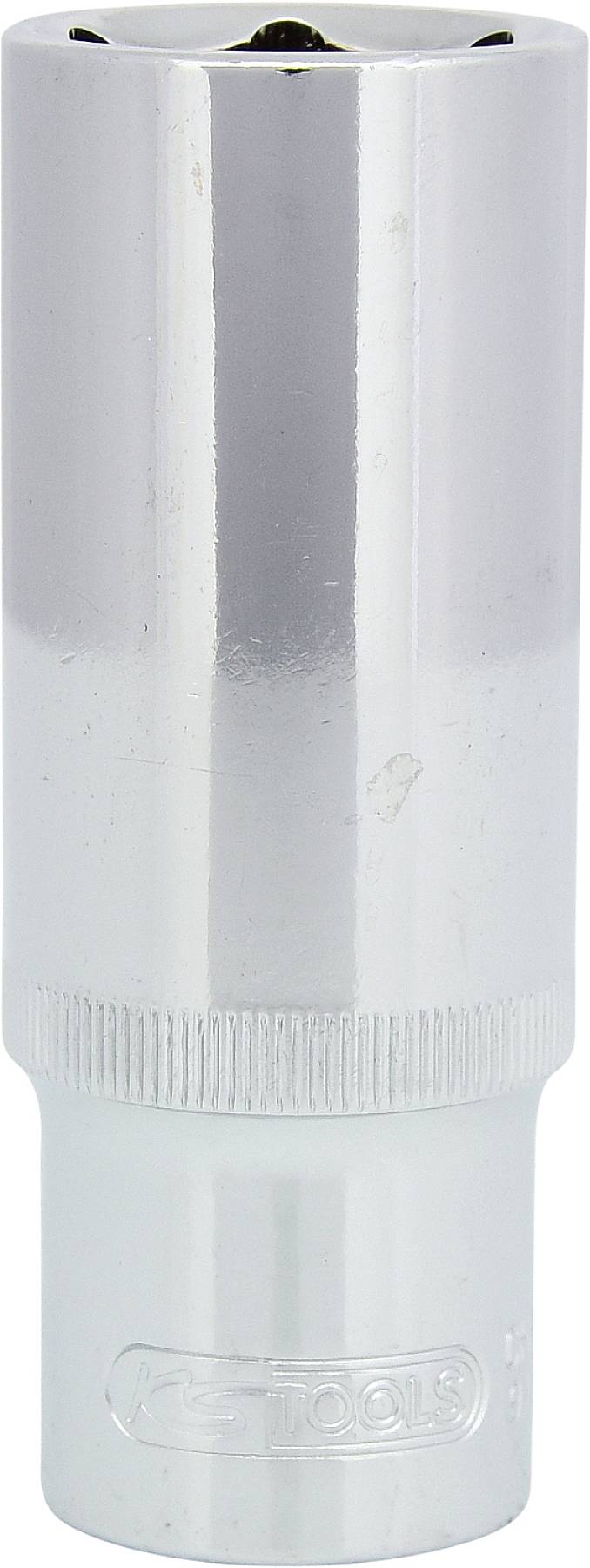 Une noix de bougie en argent à surface lisse et zone de préhension striée. Adaptée aux travaux mécaniques de précision.