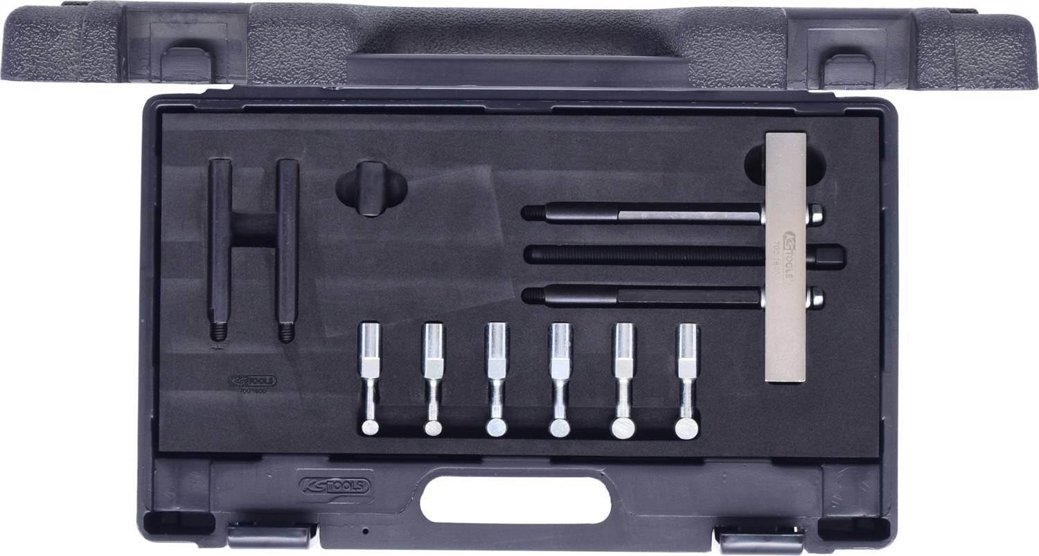 'Ensemble d'outils spécialisés dans un coffret en plastique noir, comprenant des tournevis, des clés et différents embouts.'