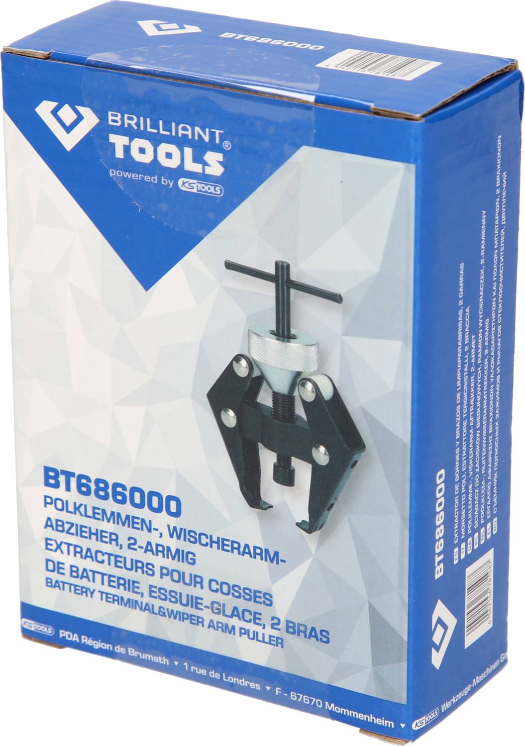 Emballage d'une boîte à outils contenant un extracteur à deux bras pour bornes de batterie et bras d'essuie-glace. Marque 'Brilliant Tools'.