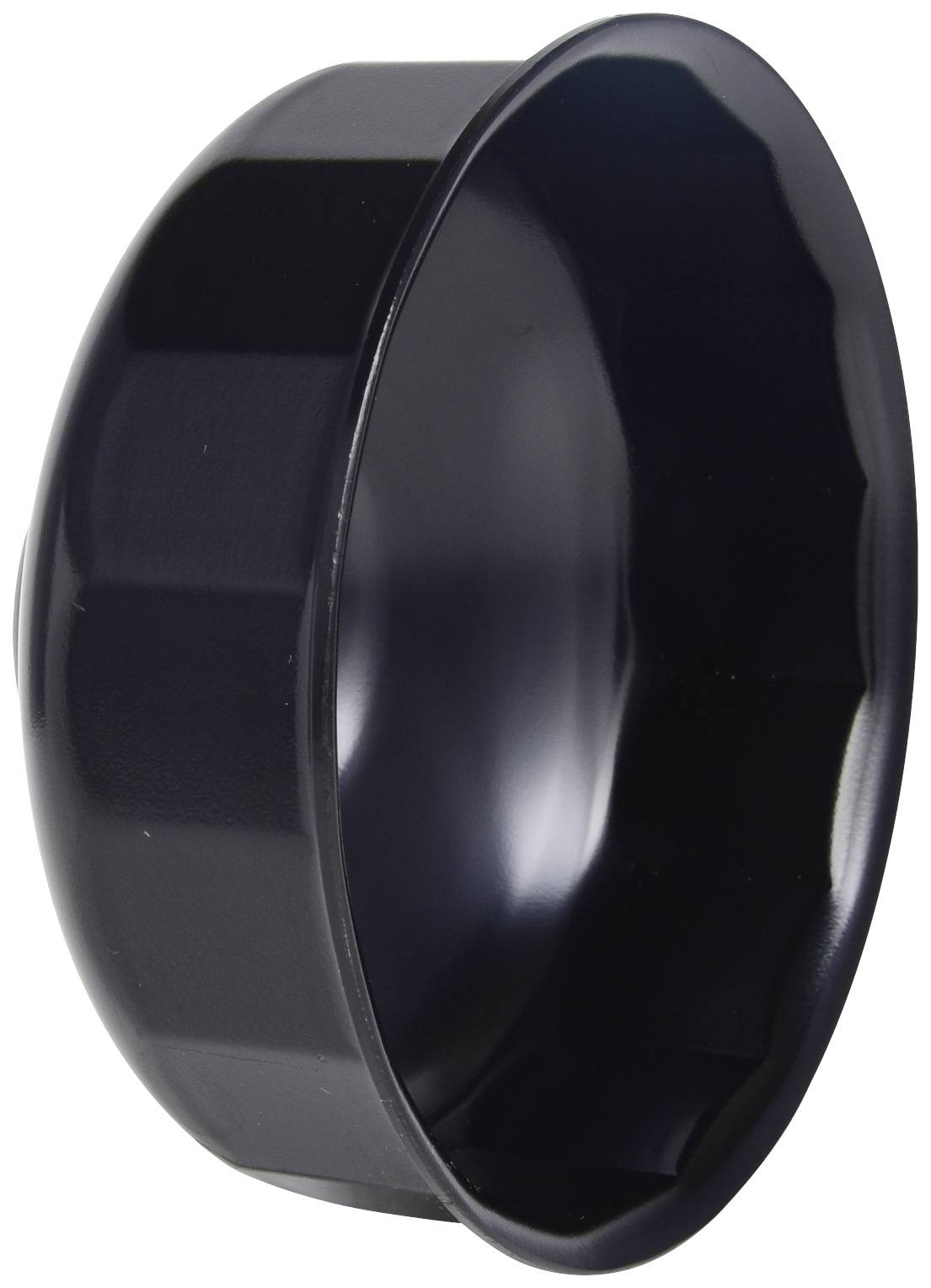 Bol rond noir en métal avec des surfaces lisses et brillantes. Utilisé pour servir ou préparer des aliments.