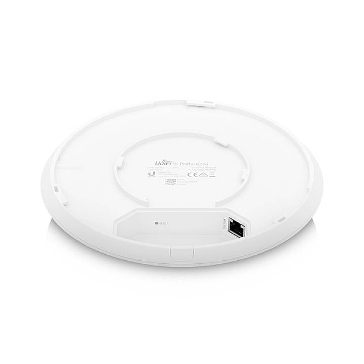 Un point d'accès Wi-Fi rond, plat et blanc avec une connexion de câble réseau et un bouton de réinitialisation sur sa face inférieure.