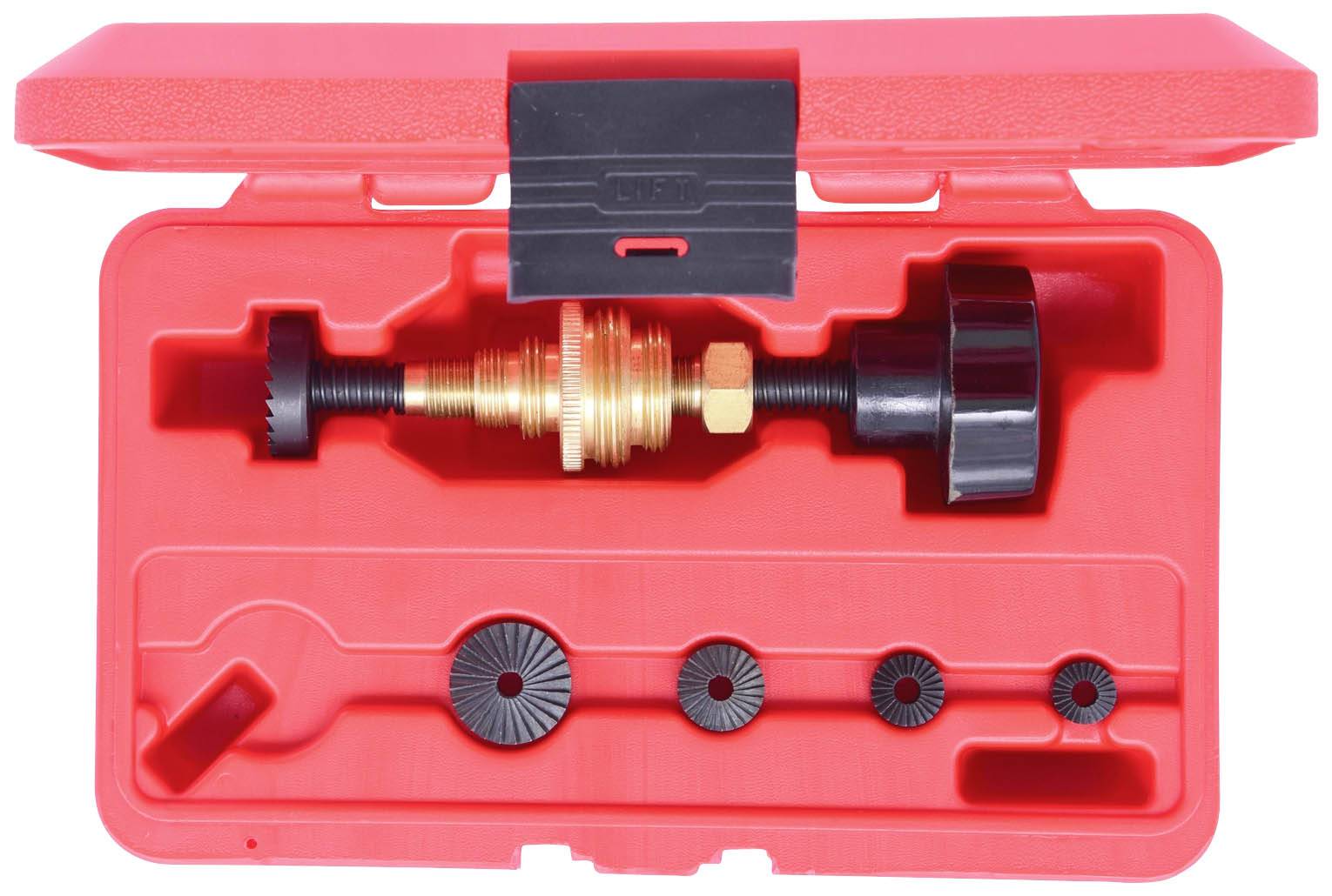 Valise rouge contenant des outils spéciaux et des accessoires pour le montage et le démontage de pièces automobiles. Comprend des outils de vissage et différents embouts.