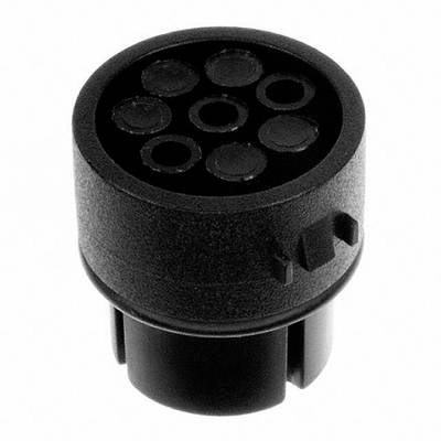 Un composant circulaire avec plusieurs connexions rondes. Il pourrait s'agir d'une fiche électrique ou d'un adaptateur.