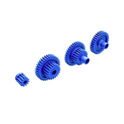Quatre roues dentées bleues, disposées du plus petit au plus grand, symbolisent le développement technologique ou les processus mécaniques.