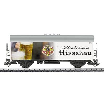 Wagon de train miniature avec la publicité de la 'Brasserie du Château de Hirschaue'. Représente deux verres de bière et un blason sur le côté du wagon.