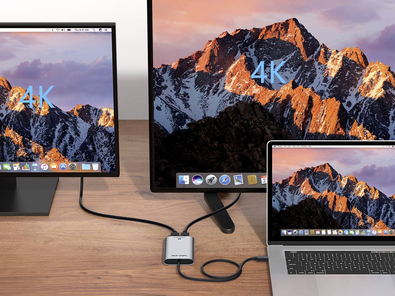 Un ordinateur portable se connecte via un câble adaptateur à deux écrans affichant des paysages montagneux 4K nets et détaillés. Idéal pour un travail haute résolution.