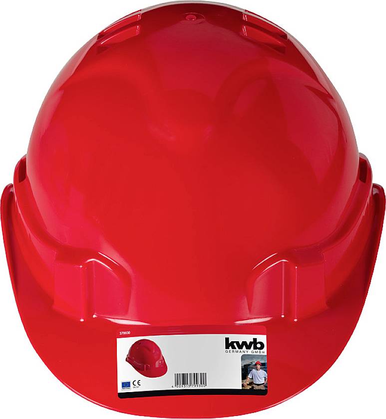 Un casque de chantier rouge avec une étiquette indiquant 'kwb Casque de protection'. Le casque est utilisé à des fins de sécurité sur les chantiers de construction.