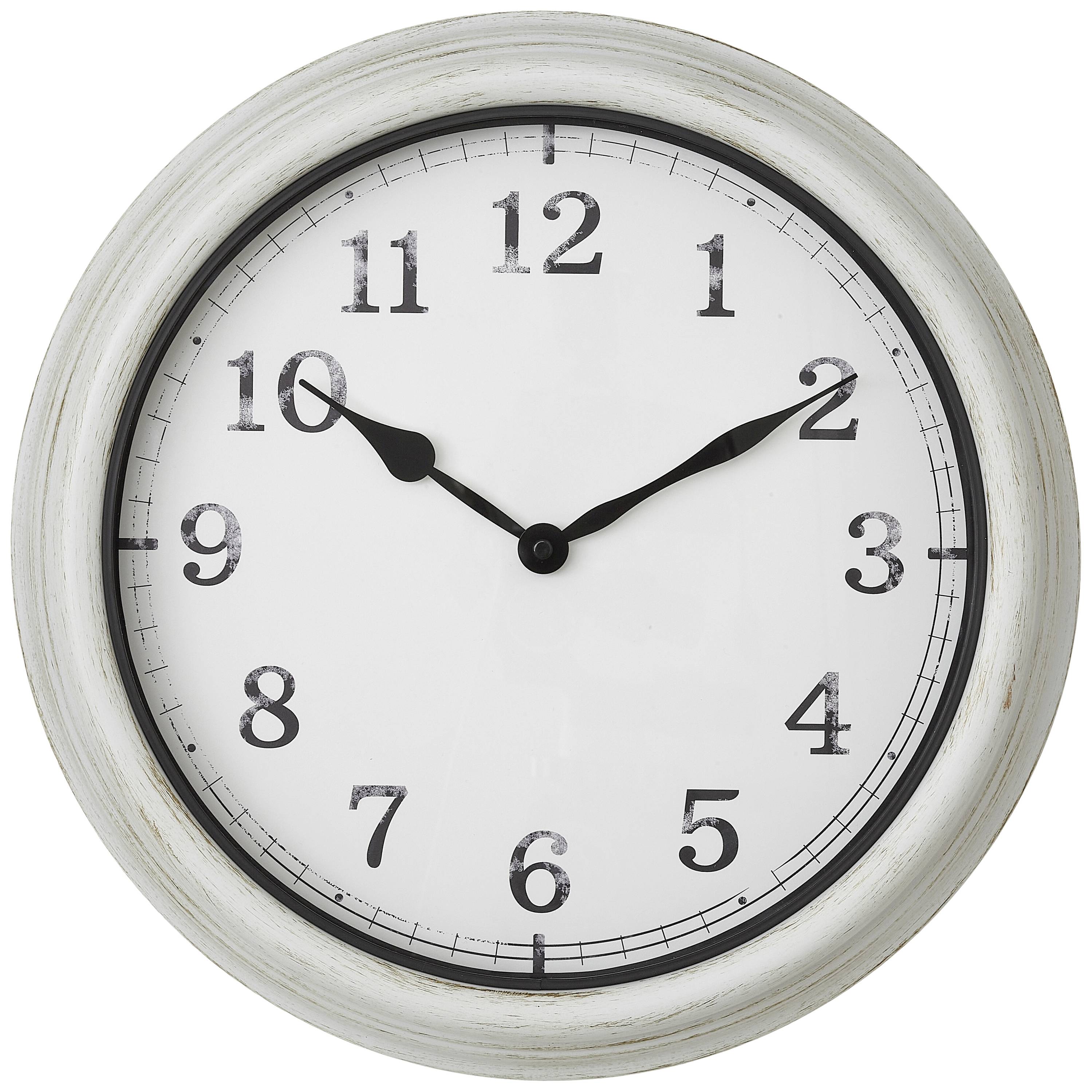 Une horloge murale analogique affiche l'heure 10:10. L'horloge a un cadran blanc avec des chiffres et des aiguilles noirs.