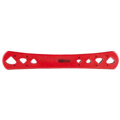 Pièce en plastique rouge avec des coins arrondis et plusieurs grands trous de formes différentes, vue de côté.