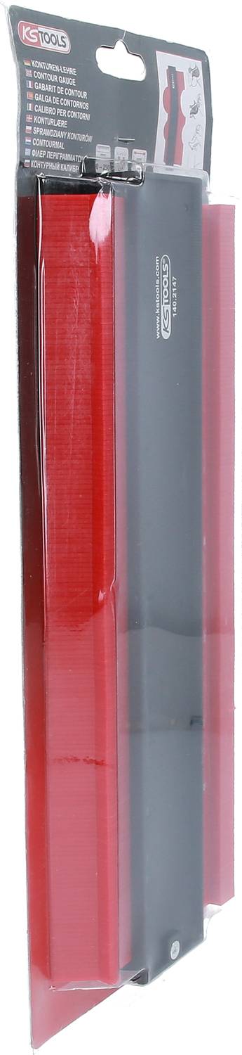 Un outil de contour en noir et rouge, emballé dans un emballage en plastique transparent avec une carte en carton sur le dessus.