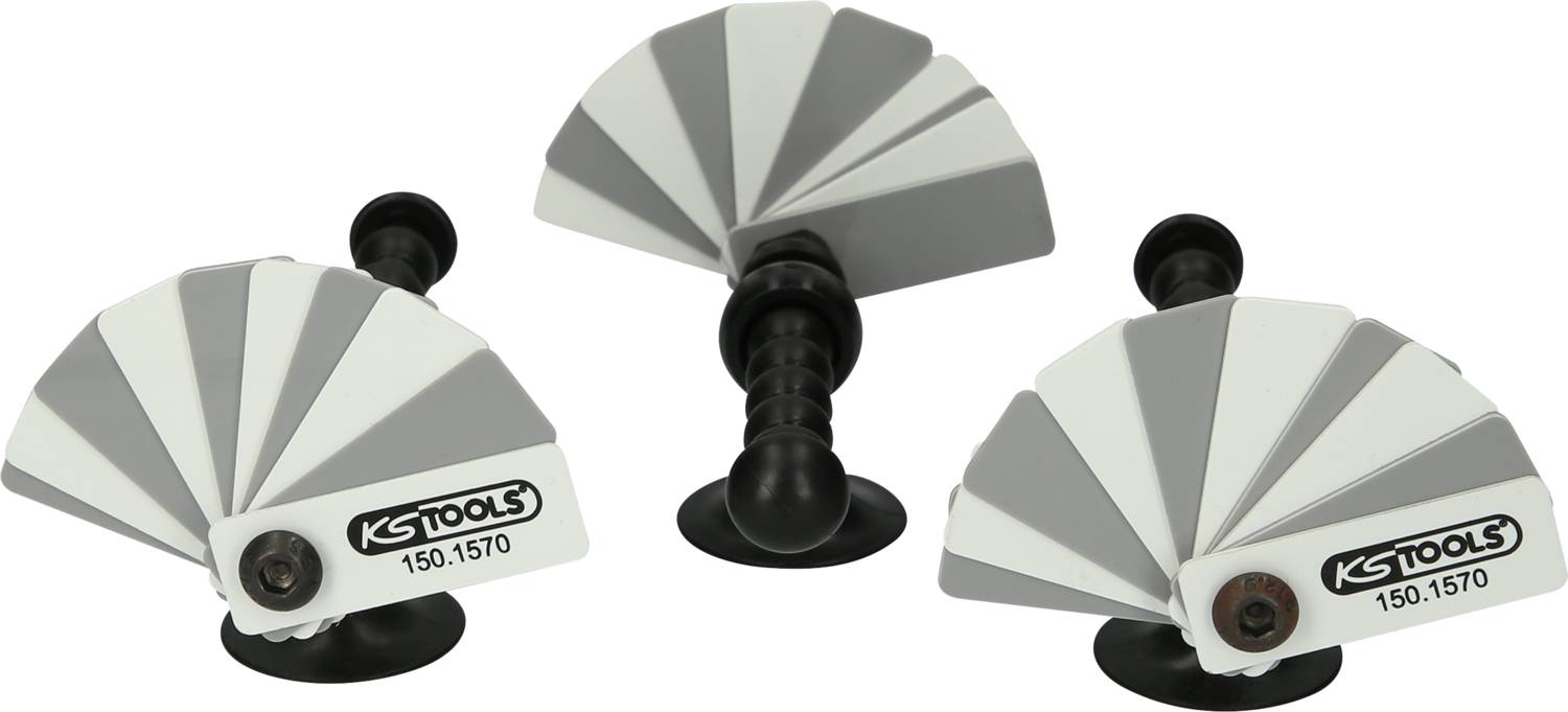 Trois jeux de nuanciers avec jauges de nuances et logo 'KS TOOLS 150.1570', destinés à comparer les tons de gris dans les applications de peinture.