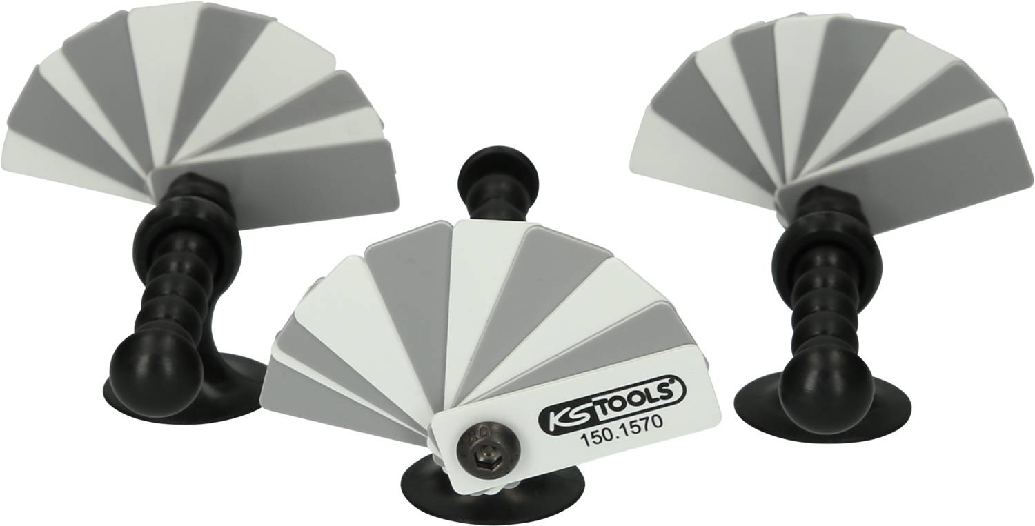 Trois outils flexibles gris et blancs avec une structure rappelant un ventilateur, idéaux pour s'adapter à différentes surfaces ou angles.