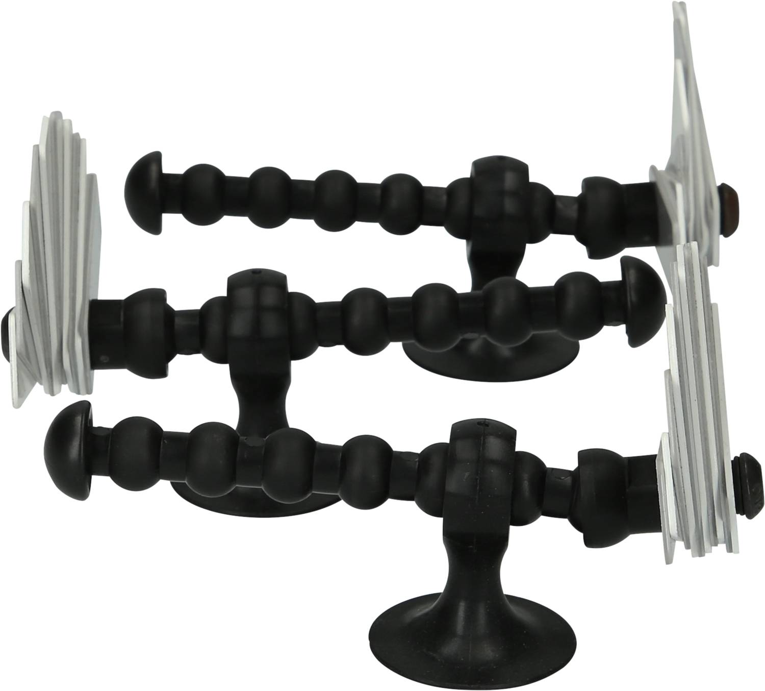 Trois outils en plastique noir, ondulés, avec des socles ronds et des surfaces en aluminium blanc à leurs extrémités, disposés côte à côte.