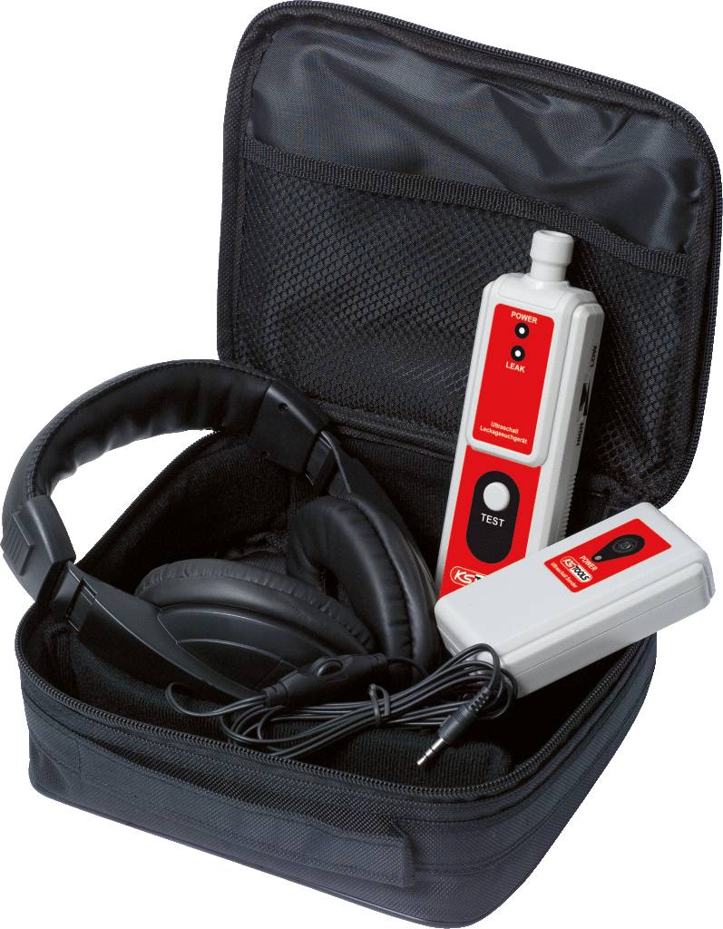 Écouteurs et deux appareils électroniques rouges dans un sac de transport noir. Les appareils ont des boutons et le mot 'Test' est visible.