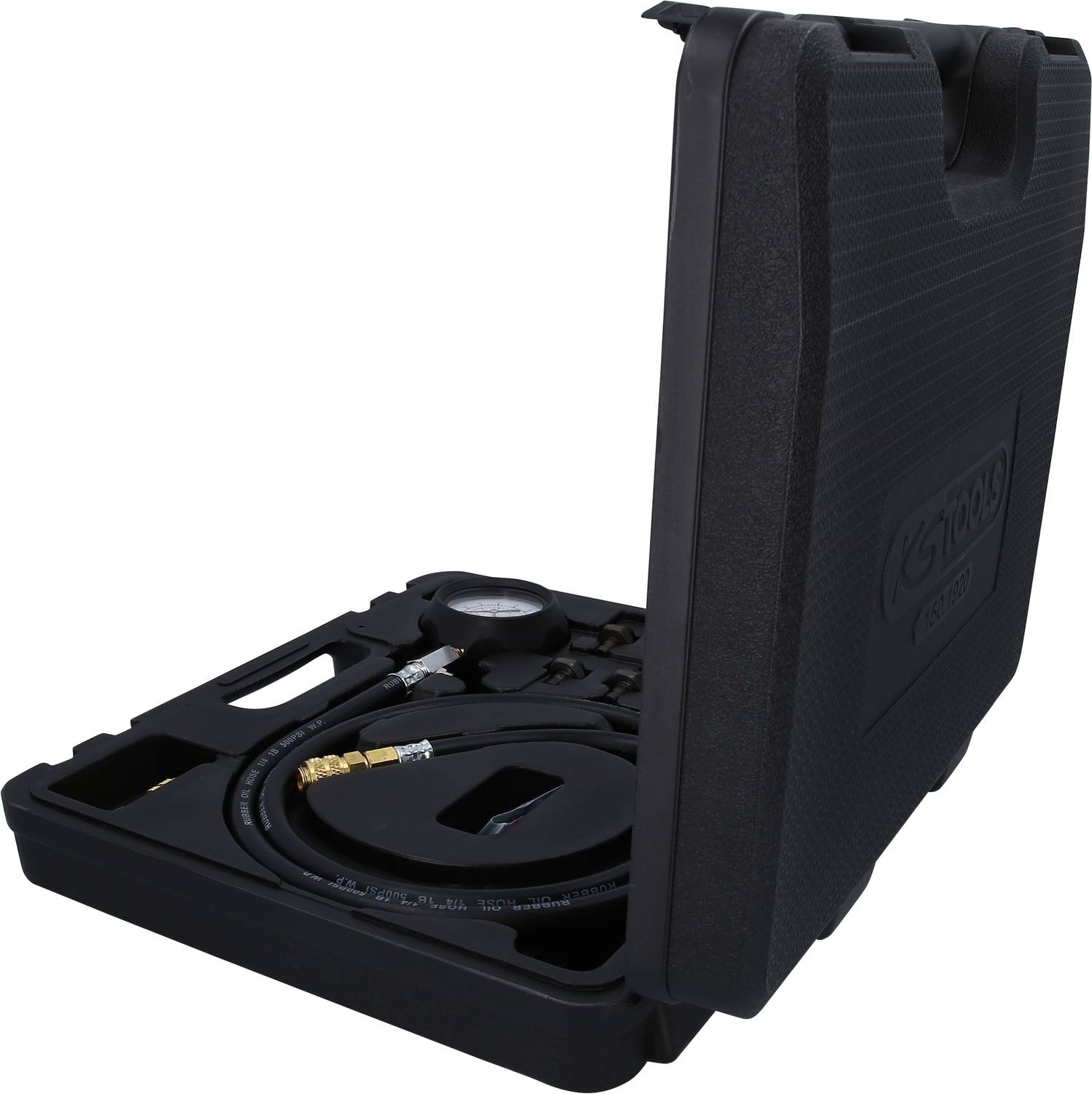 Un coffret noir ouvert en plastique contenant un manomètre et des tuyaux pour tester des systèmes de pression.