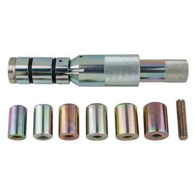 Ensemble d'outils pour chevilles coniques avec cheville conique. En haut se trouve la poignée conique, en bas sont disposées différentes tailles de chevilles coniques et un ressort.