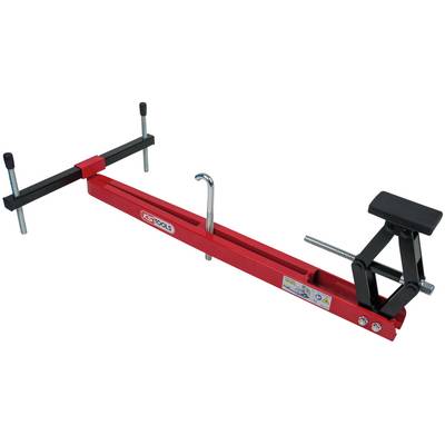 Outil de pont moteur rouge avec levier noir et crochet métallique. Utilisé pour assister lors de la maintenance et des réparations de moteurs.